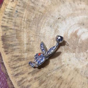 Playboy belly ring